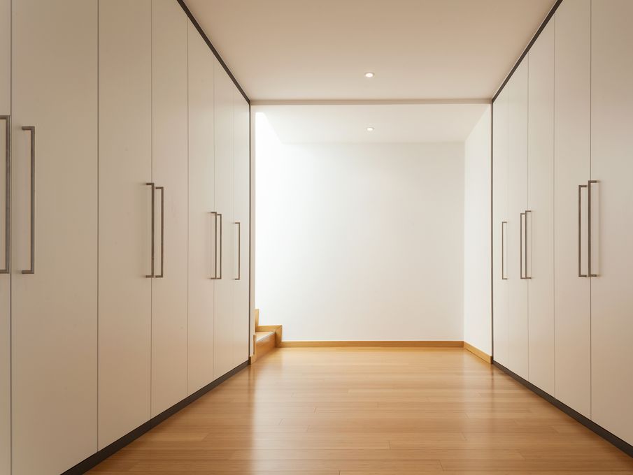 interior of a modern house, long corridor with wardrobes